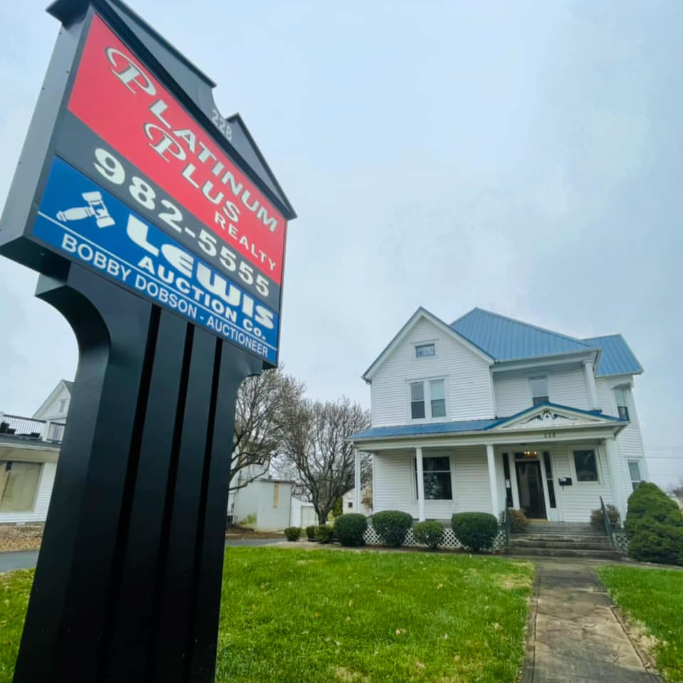 Platinum Plus Realty Sign and Building